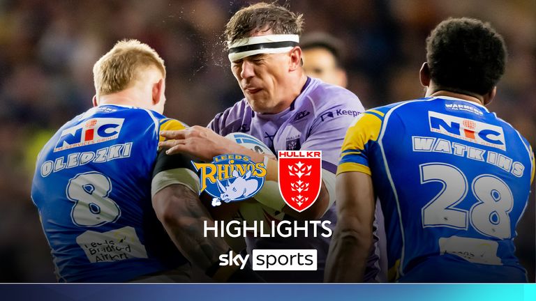 Picture by Allan McKenzie/SWpix.com - 25/04/2025 - Rugby League Round 9 - Betfred Super League - Leeds Rhinos v Hull KR - AMT Headingley, Leeds, England - Hull KR's Jai Whitbread is tackled by Leeds' Mikolaj Oledzki.