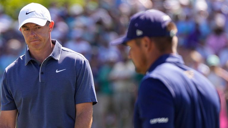 Rory McIlroy, of Northern Ireland, watches Bryson DeChambeau on the sixth hole during the final round at the Masters golf tournament, Sunday, April 13, 2025, in Augusta, Ga. (AP Photo/Julia Demaree Nikhinson)