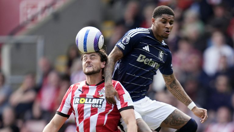 Southampton's Taylor Harwood-Bellis and Aston Villa's Marcus Rashford (right) battle for the ball