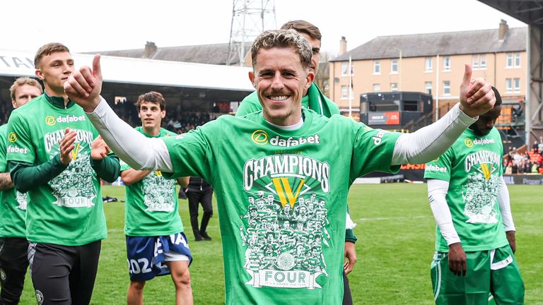 DUNDEE, SCOTLAND - APRIL 26: Celtic's Luke McCowan celebrates winning the William Hill Premiership Title during a William Hill Premiership match between Dundee Utd and Celtic at the CalForth Construction Arena at Tannadice Park, on April 26, 2025, in Dundee, Scotland. (Photo by Craig Williamson / SNS Group)