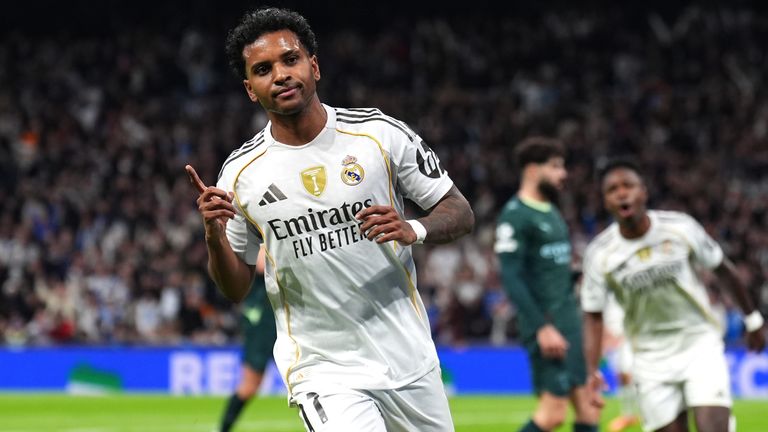 Real Madrid's Rodrygo celebrates scoring their side's first goal of the game during the UEFA Champions League match at the Bernabeu in Madri