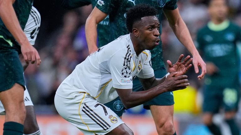 Real Madrid's Vinicius Junior gestures during a Champions League opening phase soccer match between Real Madrid and Manchester City, in Madrid, Spain, Wednesday, Dec. 10, 2025. (AP Photo/Manu Fernandez)